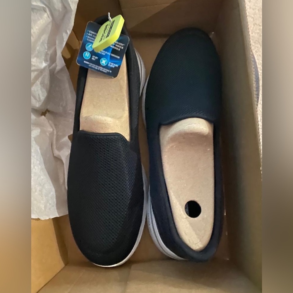 Skechers Black Slip ons